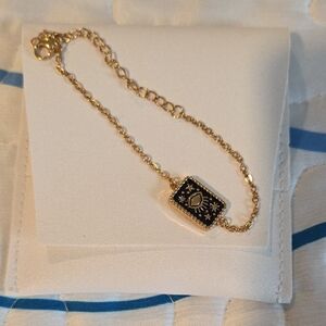 Gold and Black Eye Charm Bracelet